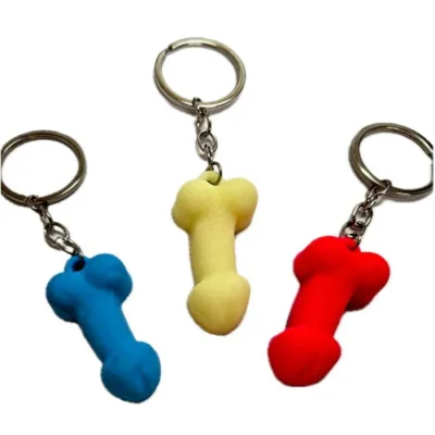 Sortimentierte silikon-penis-schlüsselanhänger in phosphoreszenzfarben